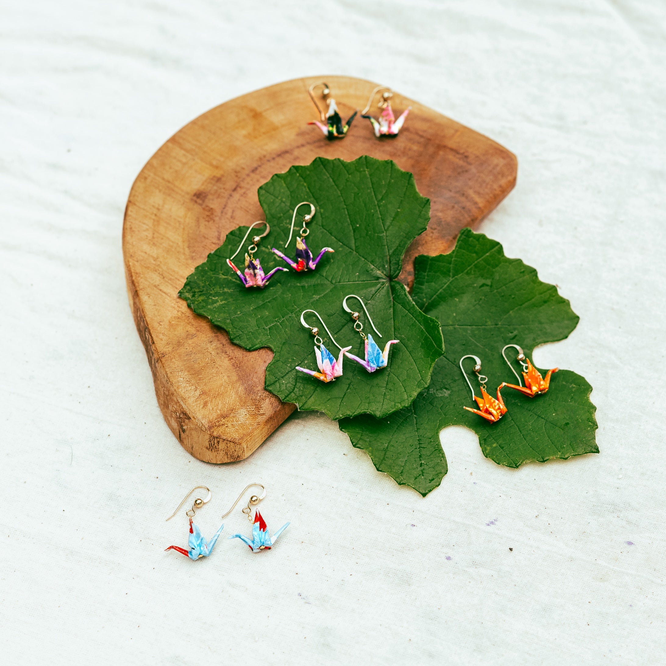 Tiny crane earrings