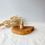 Wooden ring holder with a dainty ring