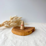 Wooden ring holder with a dainty ring