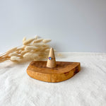 Wooden ring holder with a dainty ring