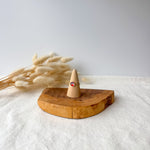 Wooden ring holder with a dainty ring